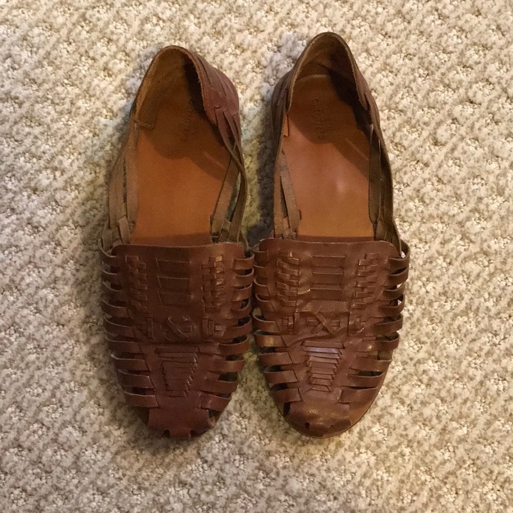 Brown leather flats
